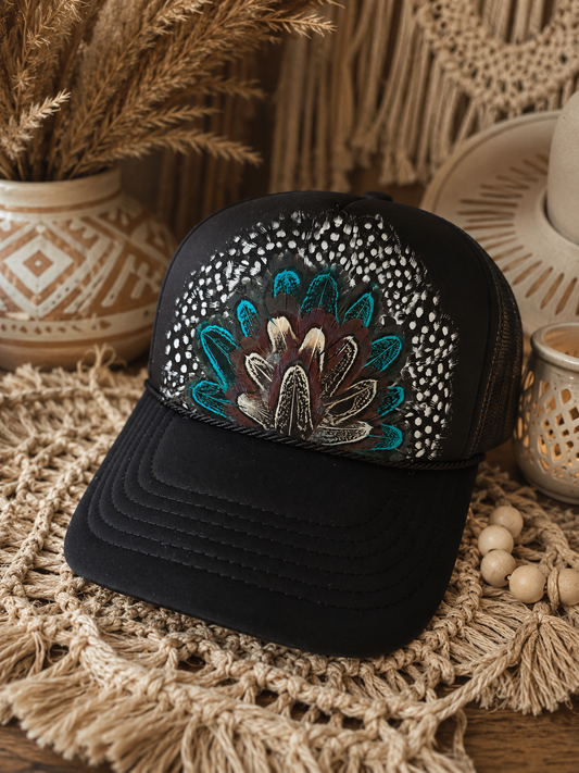 Tika Feather Trucker