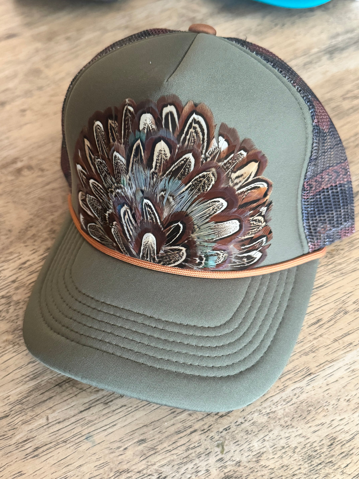 Addy Feather Trucker – Riddle Boutique